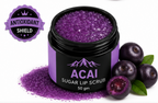 Acai sugar lip scrub with acai berries and acai berry fruit on a white background