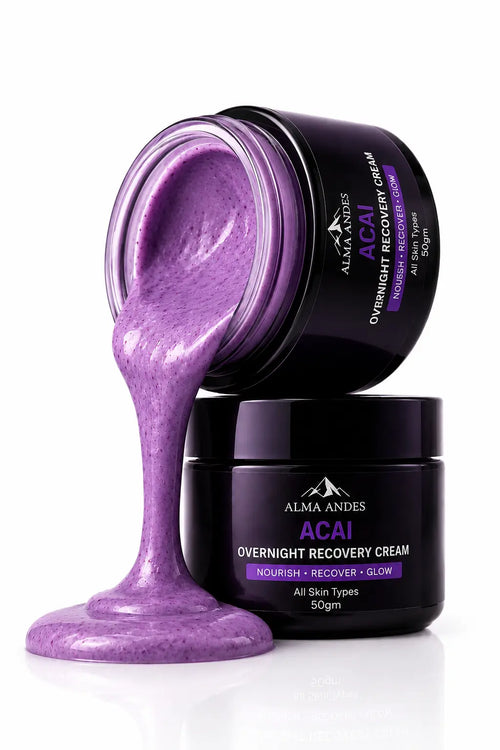 Alma Andes Acai Overnight Recovery Cream in a dark jar with purple cream dripping out onto a white surface, with a second closed jar behind it.