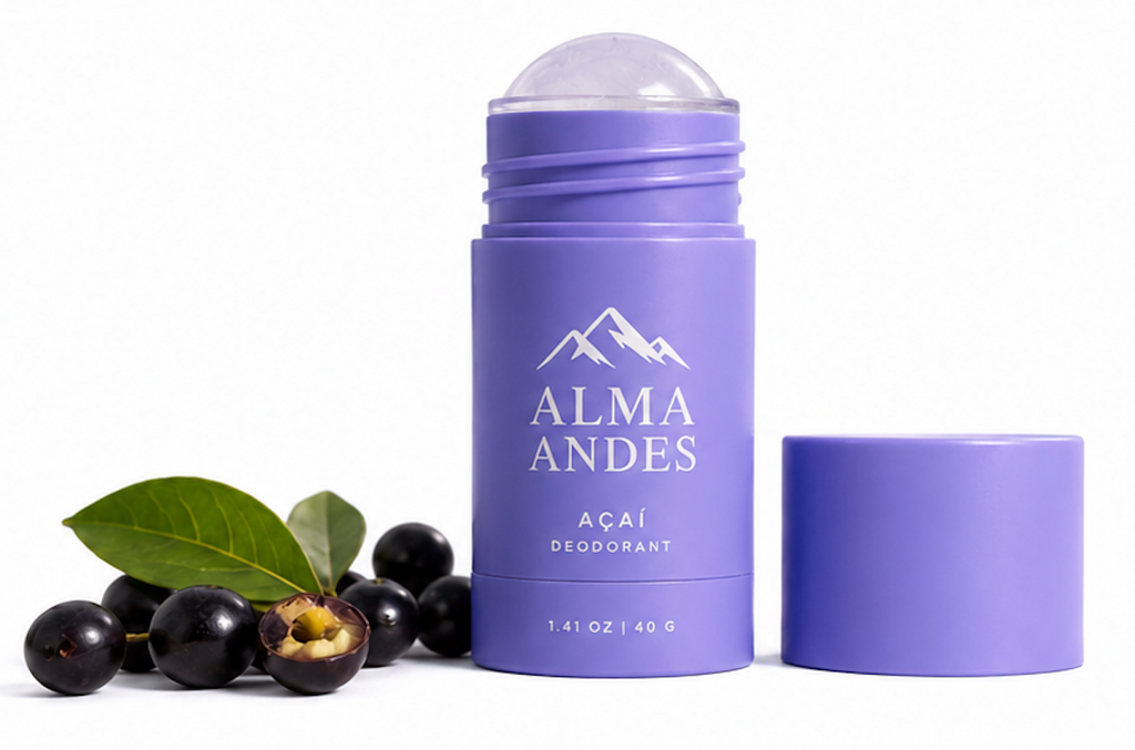 Purple deodorant stick with 'Alma Andes' branding, surrounded by acai berries and leaves on a white background.
