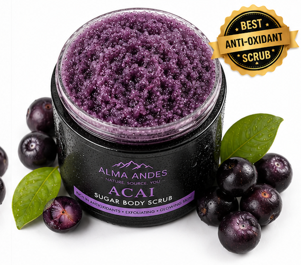 Acai sugar body scrub in a jar with a label, surrounded by acai berries and leaves on a white background.