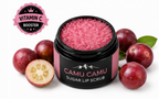 Camu Camu sugar lip scrub with vitamin C booster label and camu camu berries on a white background