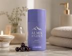 Purple deodorant container with 'Alma Andes' branding on a bathroom counter.