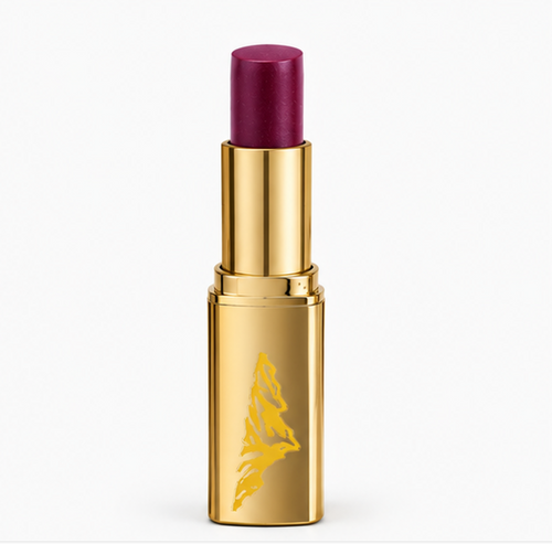 Gold lipstick case with purple lipstick on a white background
