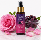 Alma Andes face mist bottle with a pink rose and grapes on a white background