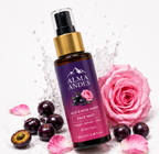 Alma Andes face mist bottle with acai berries and pink roses on a white background