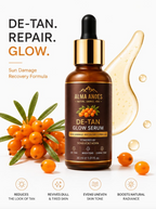 Alma Andes De-Tan Glow Serum bottle with sea buckthorn berries on a light background